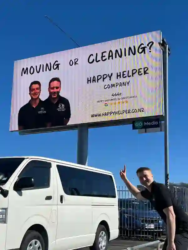 Happy Helper billboard with our van
