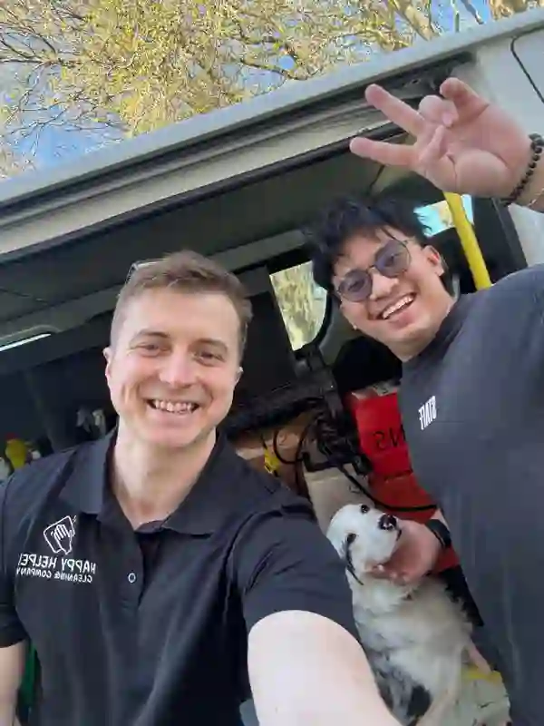 The Happy Helpers cleaning team with their van